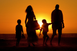 parents-children-walking-los-angeles-beach-sunset