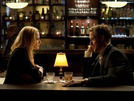 Ryan Gosling and Evan Rachel Wood in a restaurant scene from The Ides of March movie