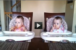 In this youtube funny video clip baby-twins-rock-out-to-dad's-guitar and laugh